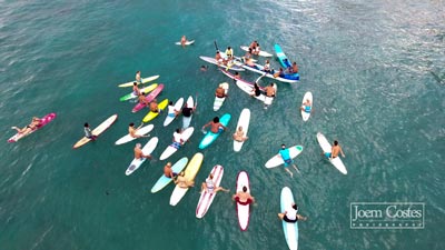 Paddle out for Pili and Matt's wedding in the ocean